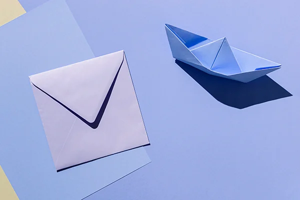top-view-paper-boat-envelope